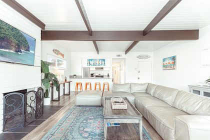 Refined living area with fireplace and relaxed coastal elegance