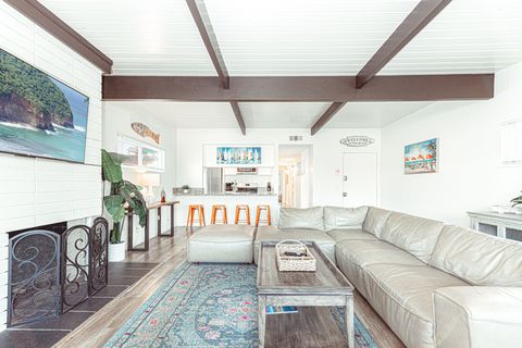 Refined living area with fireplace and relaxed coastal elegance