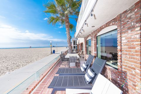 This oceanfront vacation home puts you at the foot of the soft sand beaches of Newport!