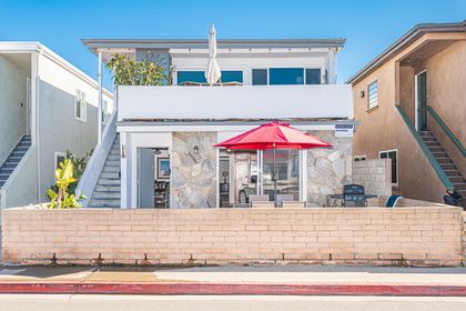 35th Street view of the entire ocean view duplex. This listing information only pertains to the downstairs 3 bd/2 ba unit.