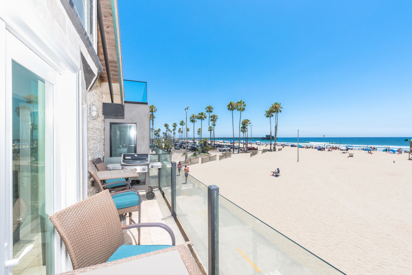 View of the glorious Newport Beach (and pier area beyond) from your front deck.