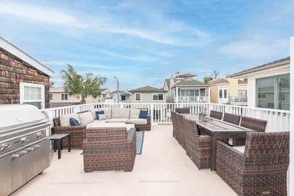 Ample seating on the oversized 2nd level deck, accessed through the primary bedroom.