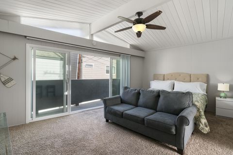 The tongue and groove wood ceiling and tasteful decor provide a beachy and relaxing ambiance.