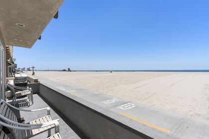 Enjoy evening cookouts on the front patio after a day at the beach.