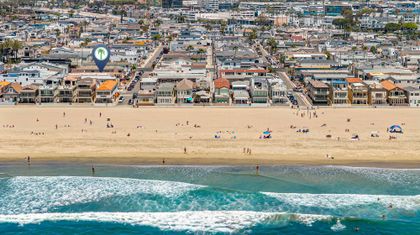 Set in a quiet coastal neighborhood, the shoreline is only moments from your door