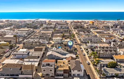 Aerial view of the property, just a short walk from the sand.
