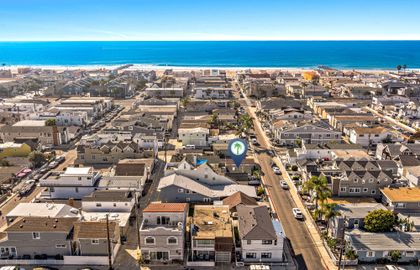 Aerial view of the property, just a short walk from the sand.