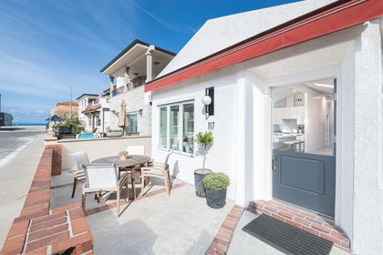 Charming outdoor patio space just steps from the sand—perfect for morning coffee or evening dining in the ocean breeze.