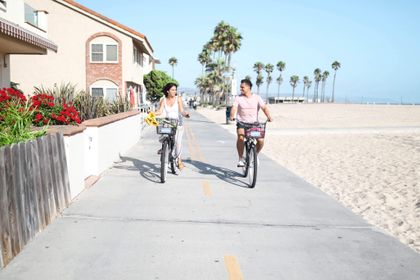 Cruise down the boardwalk on a beach cruiser - by far the best way to get around town.