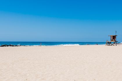 The view of the beach in front of your rental: soft sand and plenty of ocean fun!