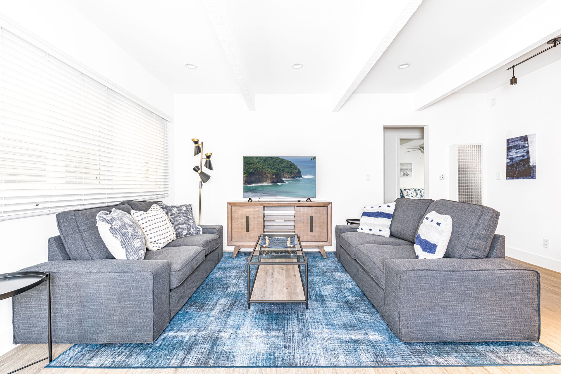 Enjoy a refreshing beach getaway in this classic Newport Beach cottage, just one house from the sand!