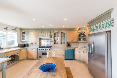 The kitchen comes stocked w/ dishes, utensils, cookware, bakeware, and all major and small appliances.
