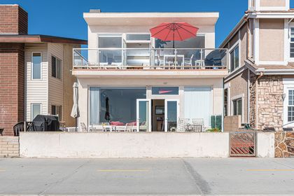 Enjoy full access to both the upper and lower residences in this oceanfront Newport Beach retreat