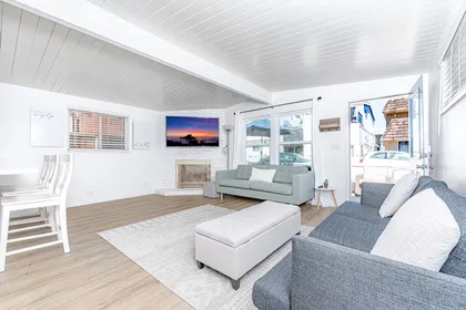 Living area opens to the front patio, for nightly cook outs and sunset happy hours.