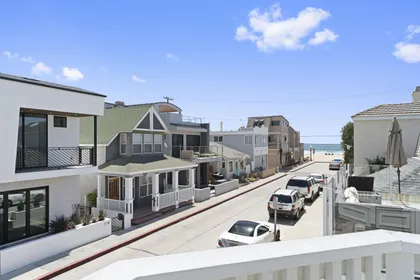 Ocean view from the small front balcony, one half block back from the 27th Street beachfront and boardwalk.