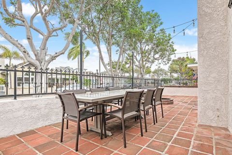 Gather outdoors on the front patio, offering seating for eight and a relaxed setting for meals