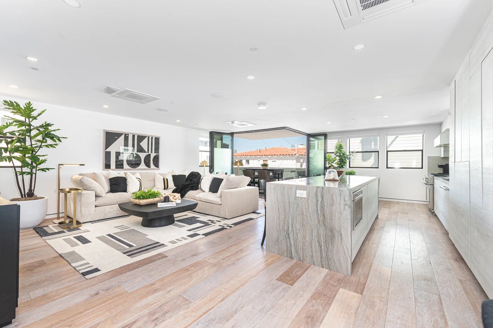 Bright, modern living room with stylish furnishings designed for relaxed coastal living