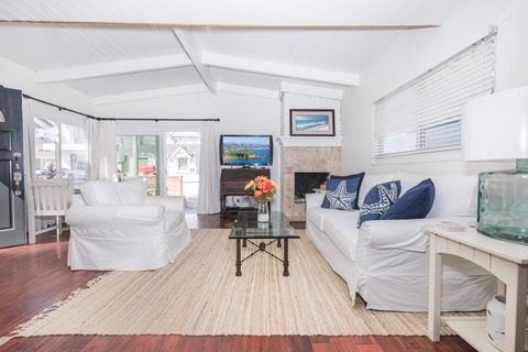In the main living area you'll find a sofa and love seat set, cable TV, a sunny breakfast nook, and sliding doors that open to the patio.