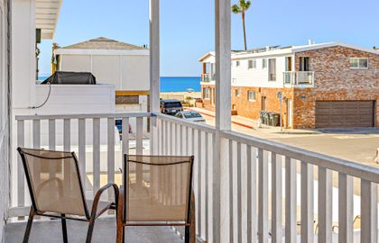 Front balcony view to the nearby 40th Street beachfront, just 2 houses away