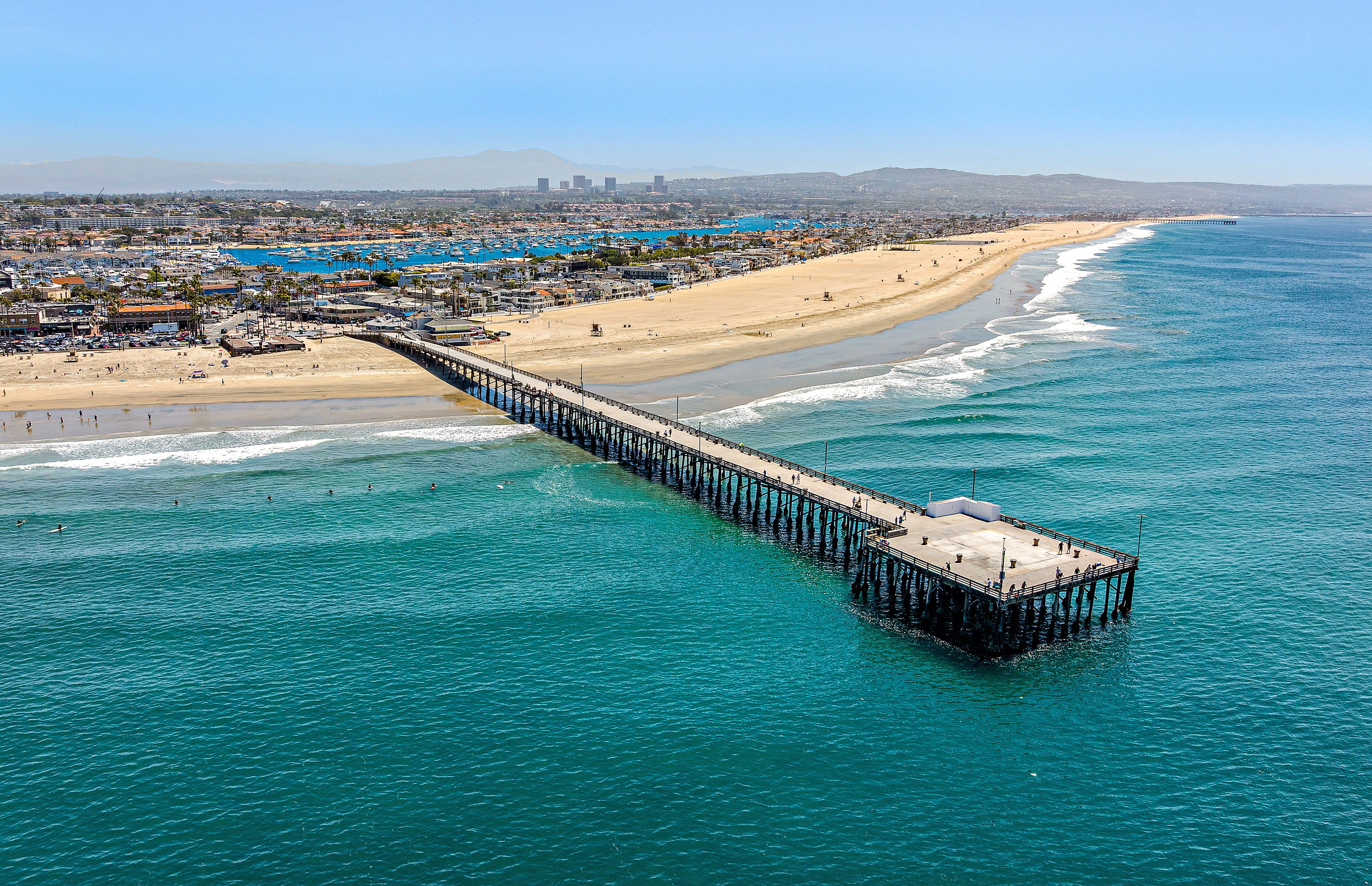 Soak up the sun, sand, and surf near the iconic Newport Pier.