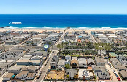 Aerial view highlighting your prime coastal location with the beach just a short stroll away
