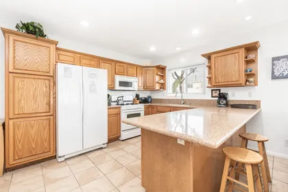 The kitchen comes stocked with all your meal prep gear: dishes, utensils, cookware, bakeware, small appliances, and all major appliances.