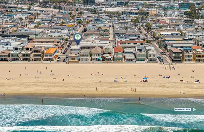 A bird’s-eye view of coastal living at its finest, just a few rooftops between you and the waves