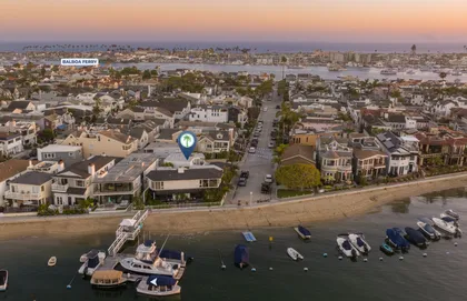 Aerial view highlighting your prime bayfront location on Balboa Island with picturesque harbor surroundings