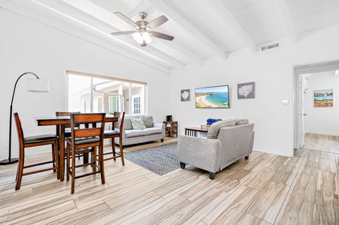 Unwind after a day at the beach with TV, games, and good conversation!