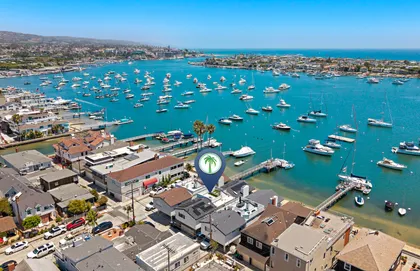 Bayfront living with postcard-worthy views across Newport Harbor