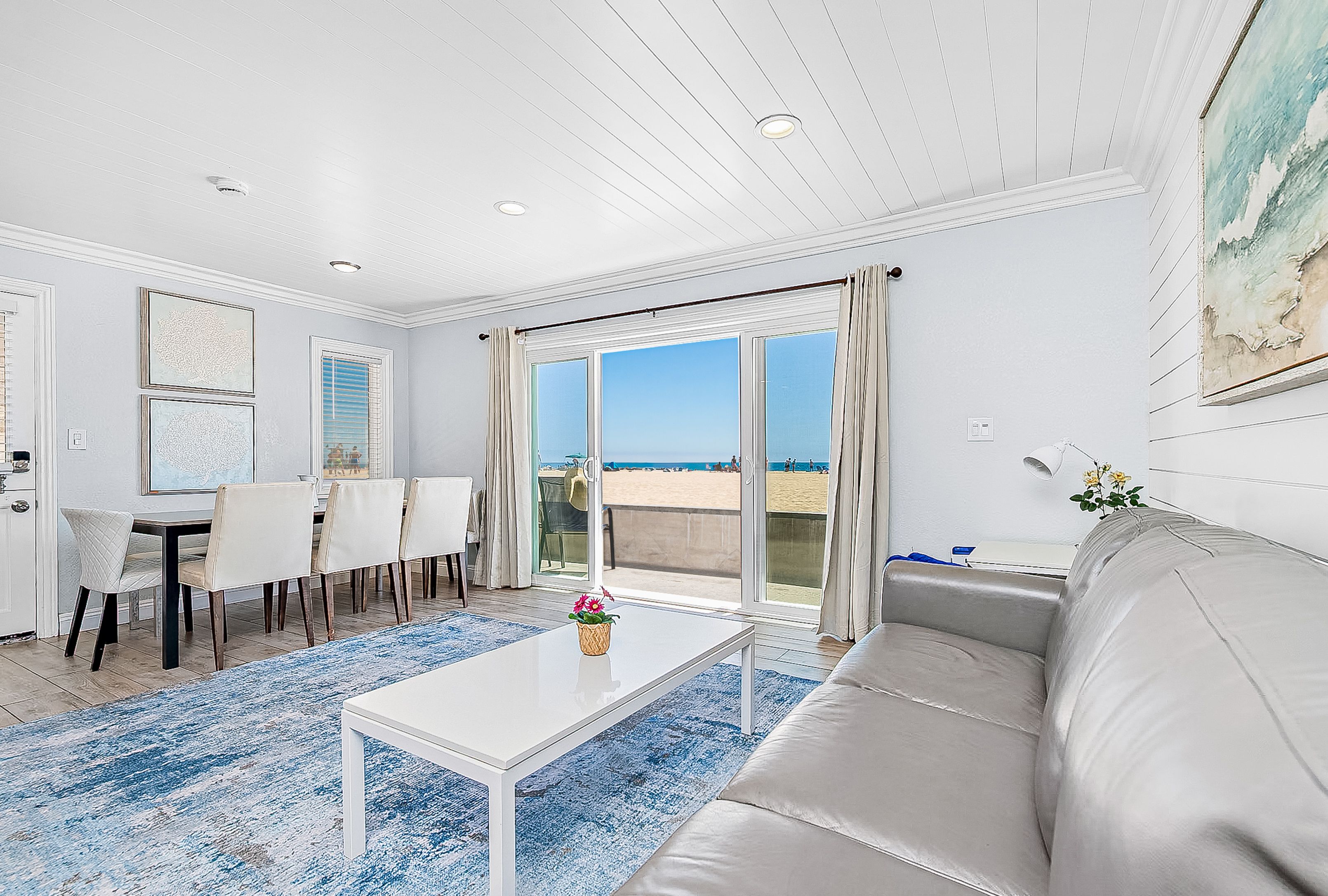 This split-level downstairs unit is a beautifully appointed, stylish property in a terrific location at 34th Street beach!