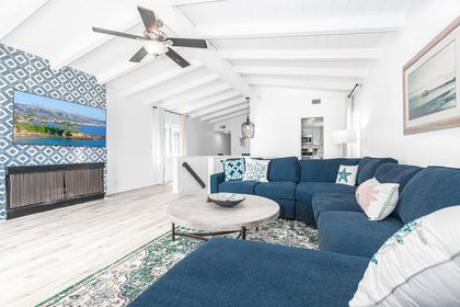 Freshly renovated & as stylish as can be, this upstairs vacation home is the perfect spot for unwinding at the beach!