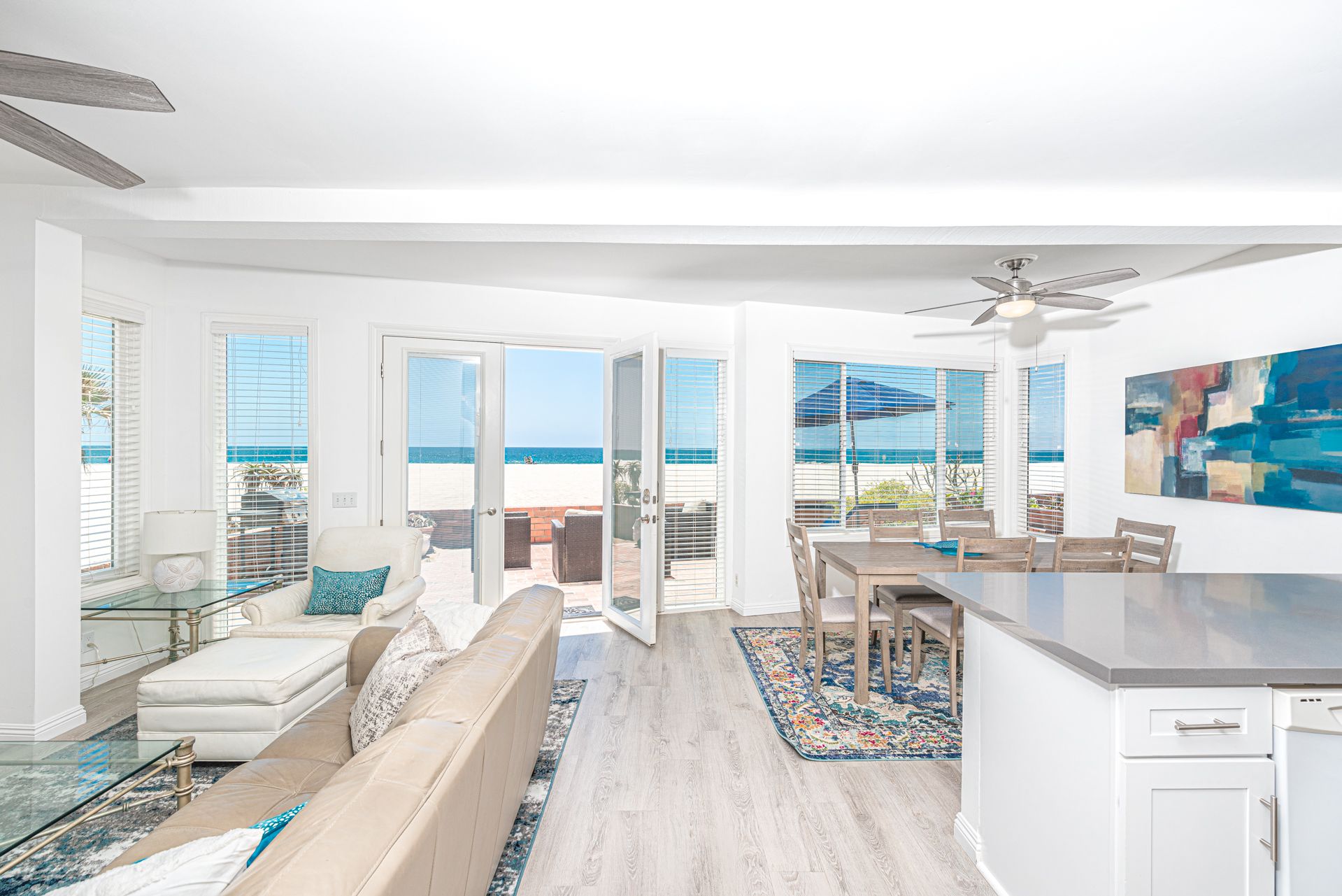 Our downstairs 2 bedroom, 2 bathroom home sits directly on the soft white sands of Newport Beach