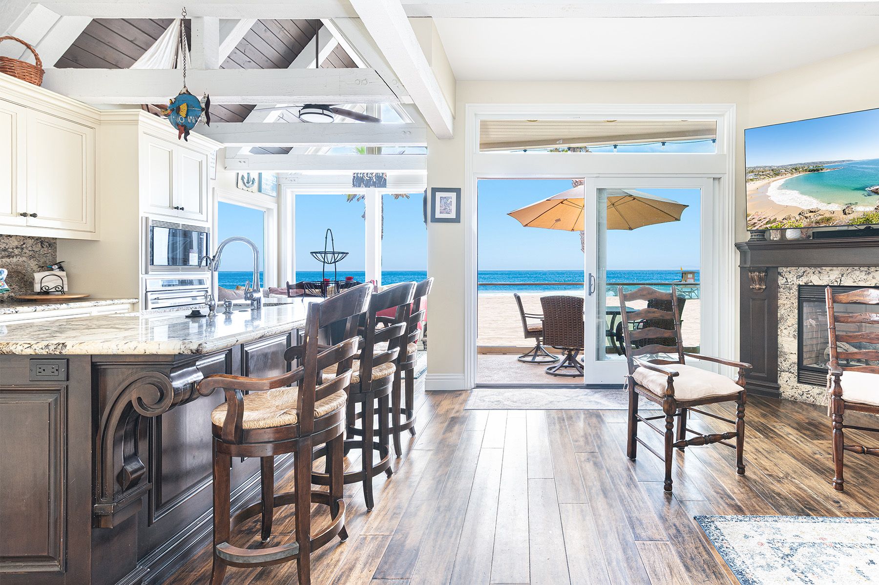 Sunlight pours through expansive oceanfront windows, enjoy front-row views of the Pacific