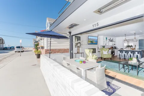 Ocean views and breezes can be enjoyed from the front patio of this tri-level condo, just 1/2 block from the 30th Street Beach and boardwalk!