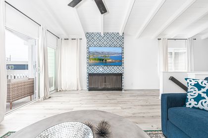 The cool coastal details make this home a relaxing retreat for groups of up to 9.