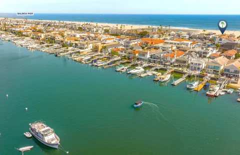 Aerial view highlighting the home’s location on the Balboa Peninsula near Newport Harbor
