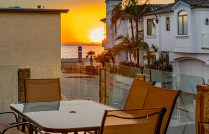 Golden hour over the Pacific, enjoyed from the private balcony on this quiet seaside neighborhood street