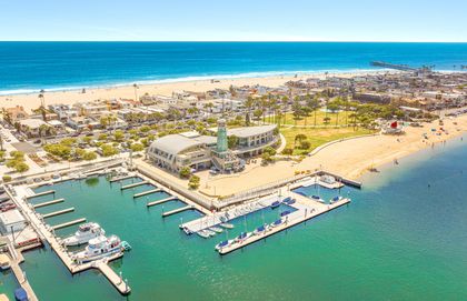Marina Park offers bayfront walking paths, a sandy beach, and scenic views of the harbor.