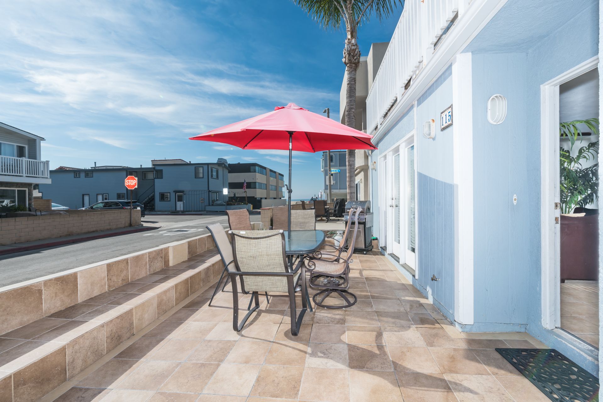 Ocean view from the coveted 34th Street front patio, two houses back from beachfront and boardwalk; includes outdoor dining, propane bbq grill, market umbrella.