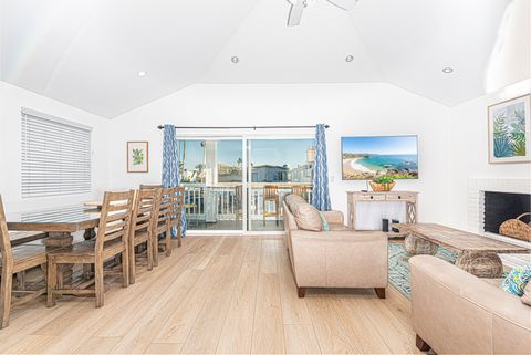 Just 9 houses from the sand, this happy upstairs unit is the perfect home base for a trip to the beach!