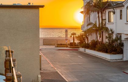 Golden hour over the Pacific, enjoyed from the private balcony on this quiet seaside neighborhood street