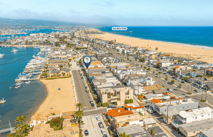 Perfectly positioned between the beach and the bay, this prime coastal retreat places you steps from the sand