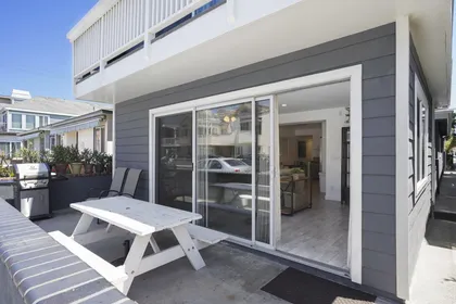 Designated patio table, seating and umbrella for this downstairs unit, along with BBQ grill. Ocean views of the 29th Street beachfront and boardwalk, just a half block away.