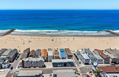 Prime Newport Beach Peninsula location just steps from the wide sandy beach