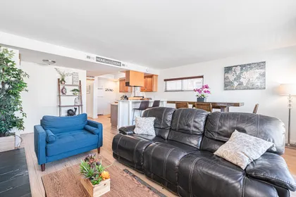 Spacious great room flowing seamlessly into the kitchen and dining area