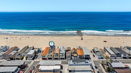 Positioned along the shoreline, this oceanfront retreat offers effortless access to the beach, boardwalk, and classic Newport charm