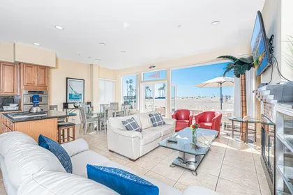 Patio doors from the main living area open up to let in those lovely ocean breezes.
