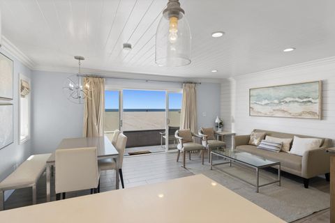 The open floor plan, which includes living/dining/kitchen areas, allows for easy group hangouts and unparalleled ocean views!