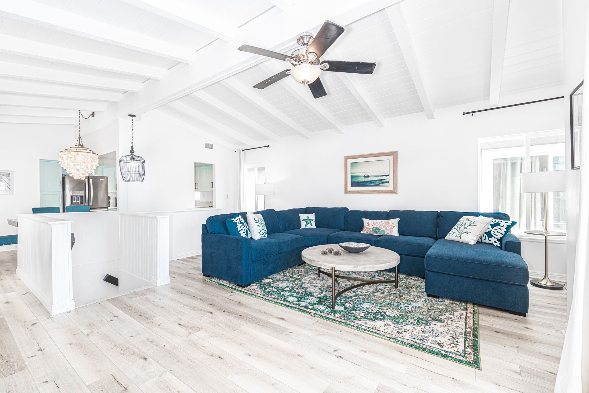 Interior stairs lead to this upper unit, where the open floor plan makes for easy group hangouts.